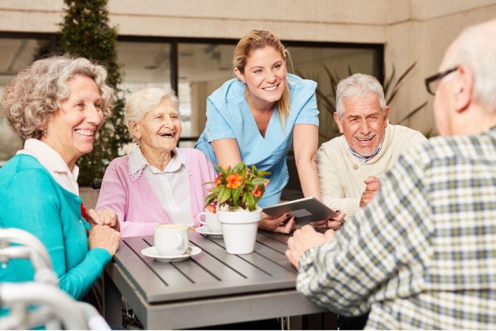 Happy seniors shown at a nursing home facility